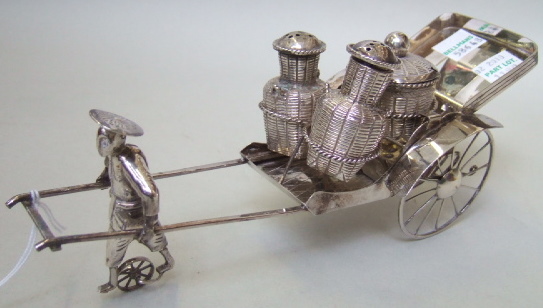 Appraisal: A Hong Kong Sterling novelty condiment set formed as a