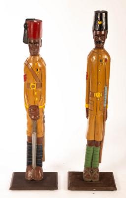 Appraisal: Two wooden carved and painted military figures one a soldier