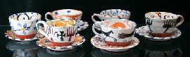 Appraisal: A set of six coffee cups and saucers in glazed