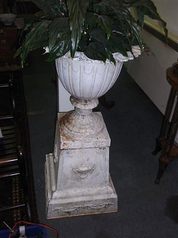 Appraisal: A VICTORIAN CAST IRON CAMPANA URN on a pedestal square