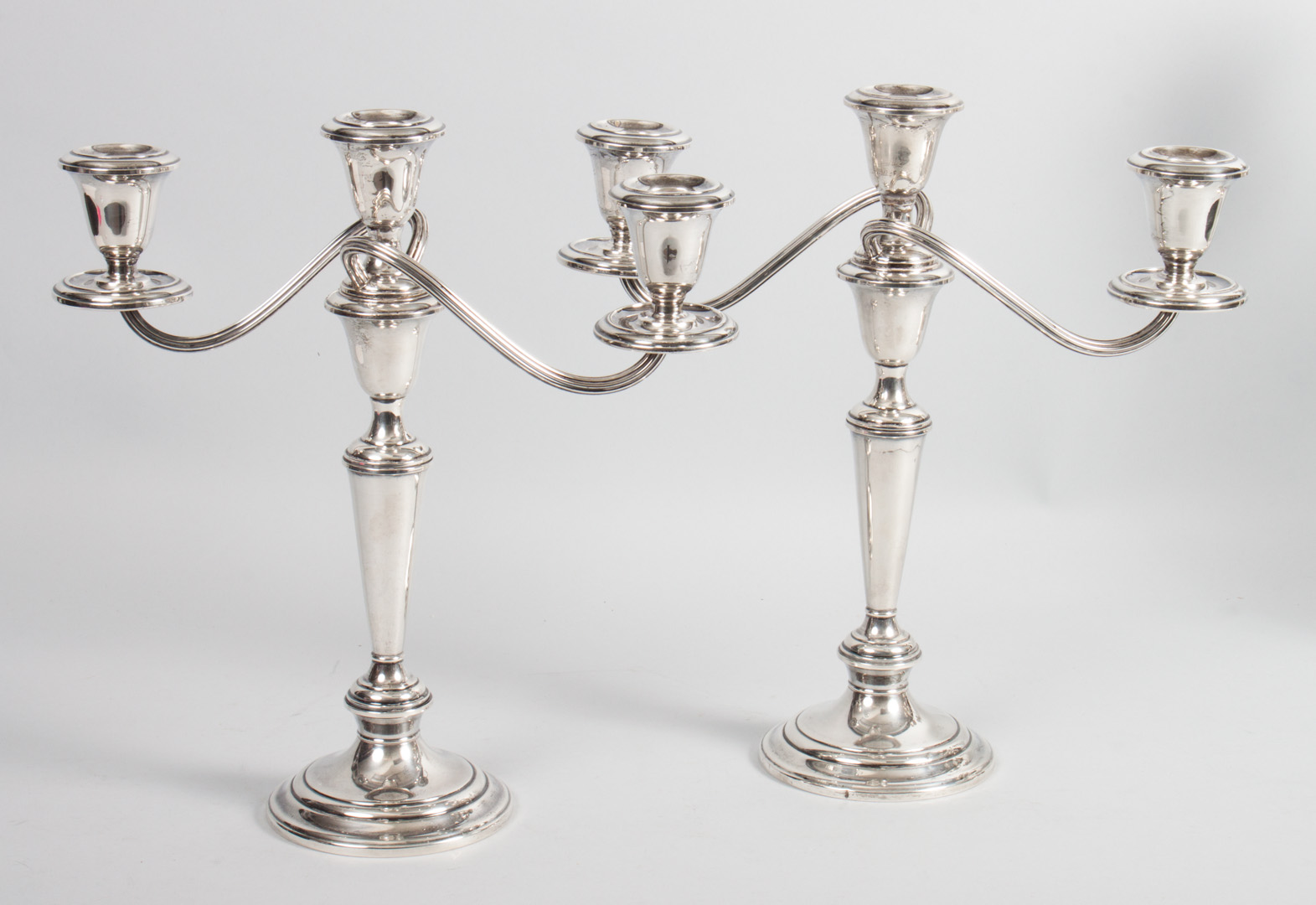 Appraisal: Pair of Gorham weighted-sterling candelabra three-light candelabra in H