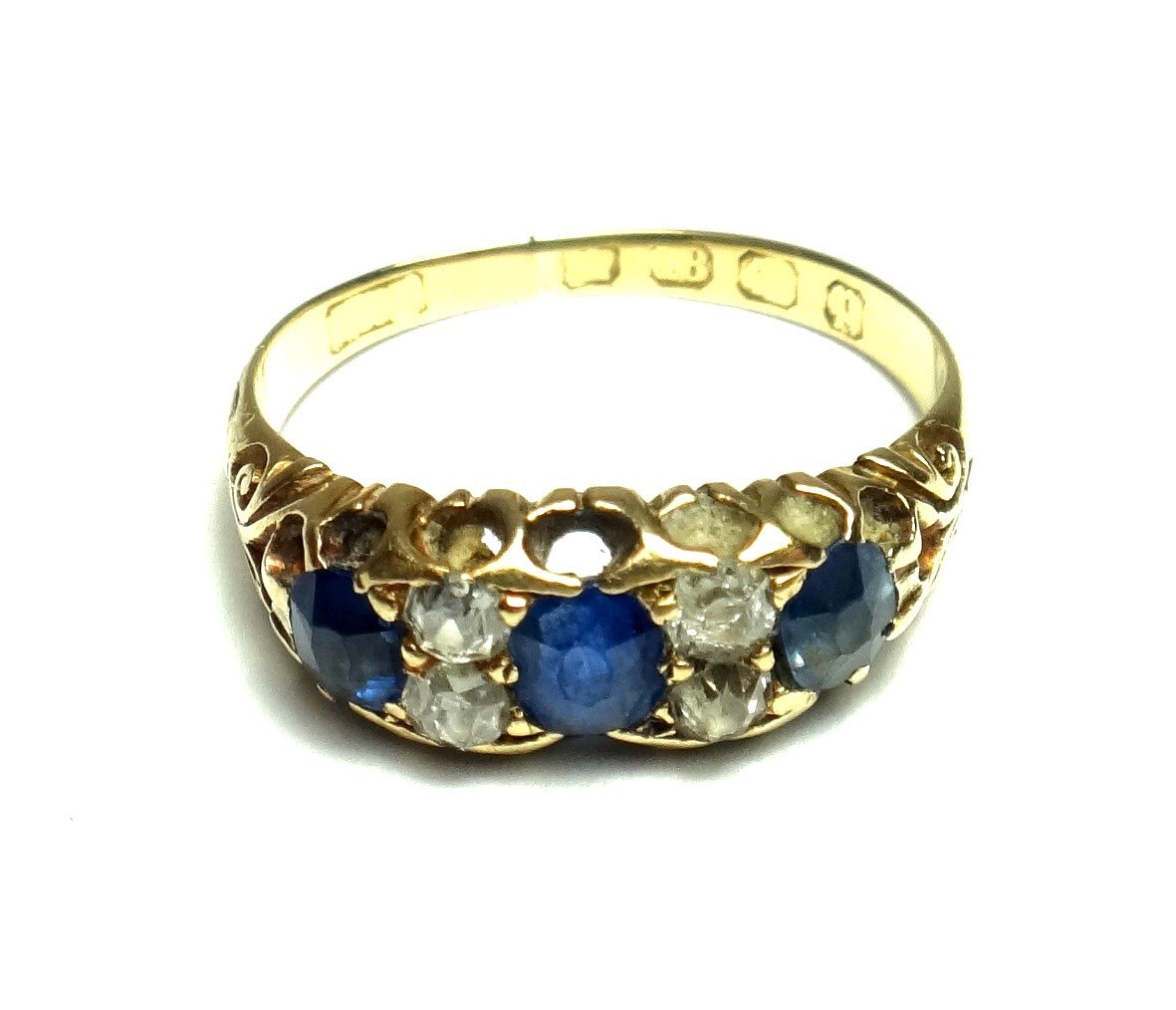 Appraisal: A Victorian ct gold sapphire and diamond set seven stone