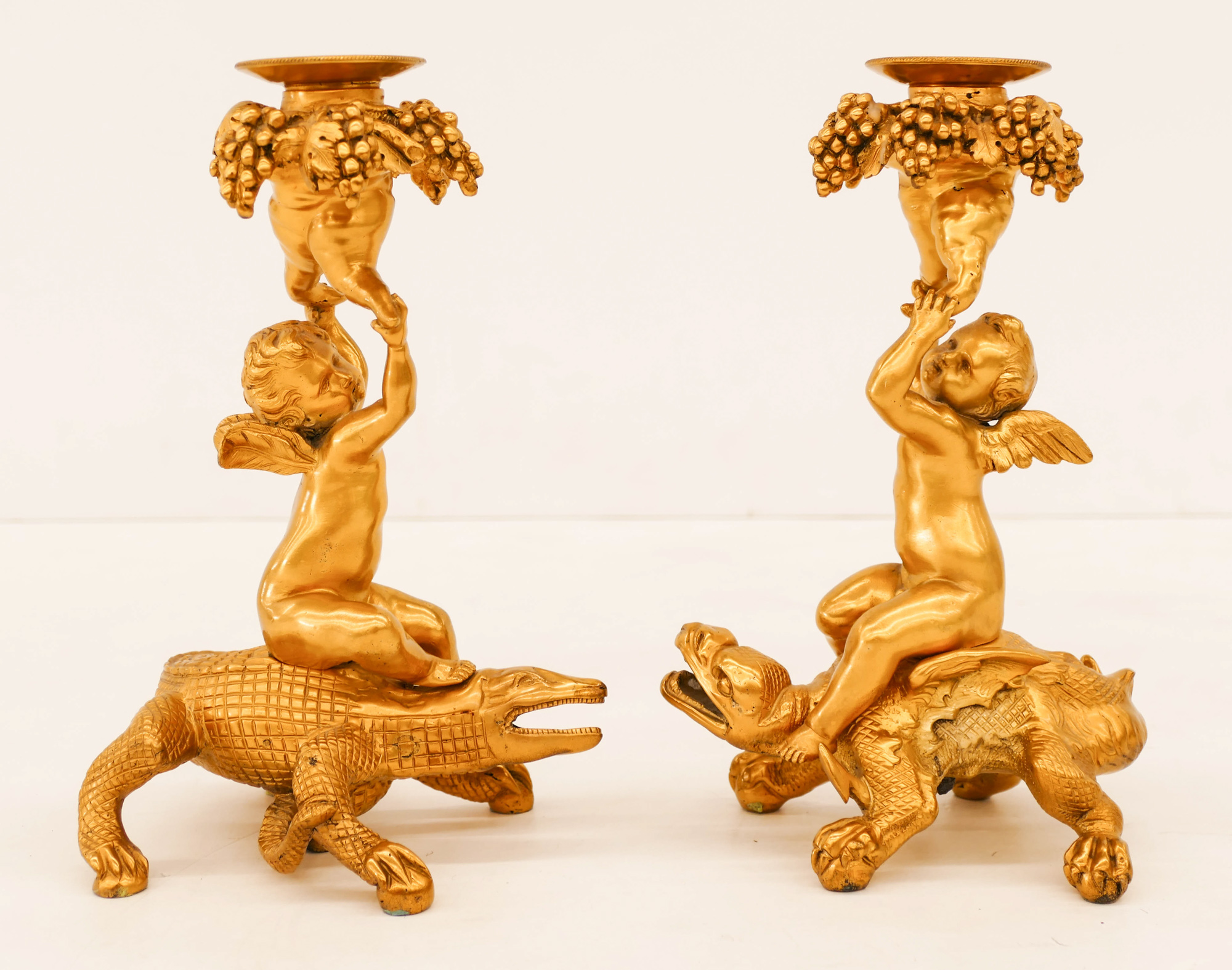 Appraisal: Pair French Gilt Bronze Putti with Alligator Candlesticks ''x ''