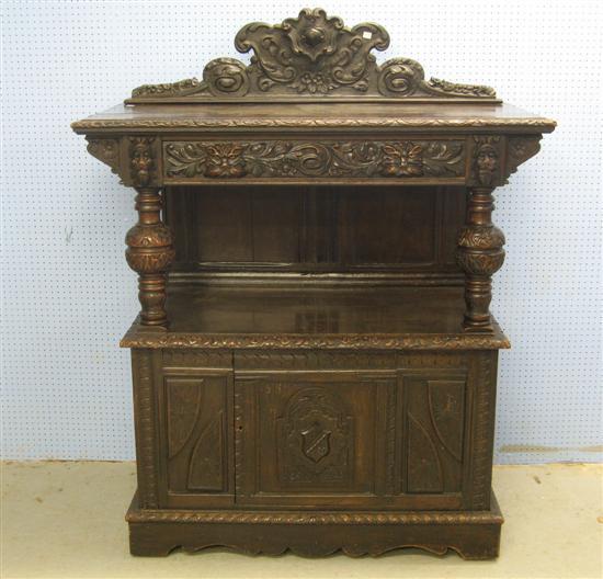 Appraisal: th Century style oak buffet with raised and carved back