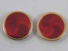 Appraisal: A pair of Russian ct gold and red enamel buttons