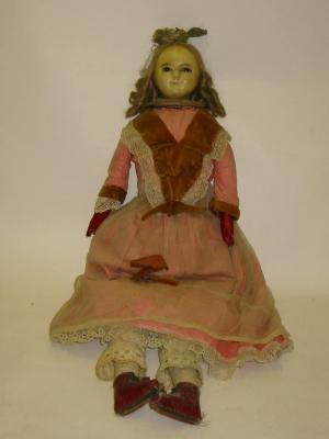 Appraisal: A th century wax over composition shoulder head doll with