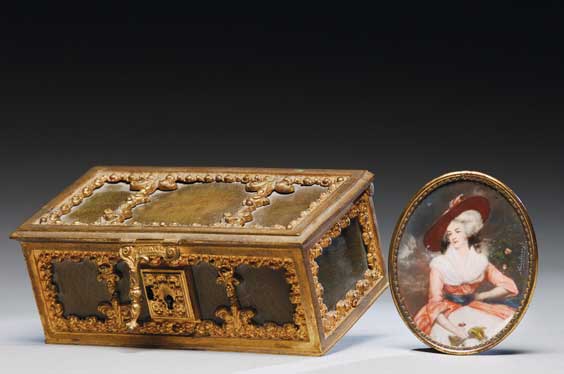 Appraisal: ORMOLU BOX AND PAINTED IVORY MINIATURE Ormolu and leather box