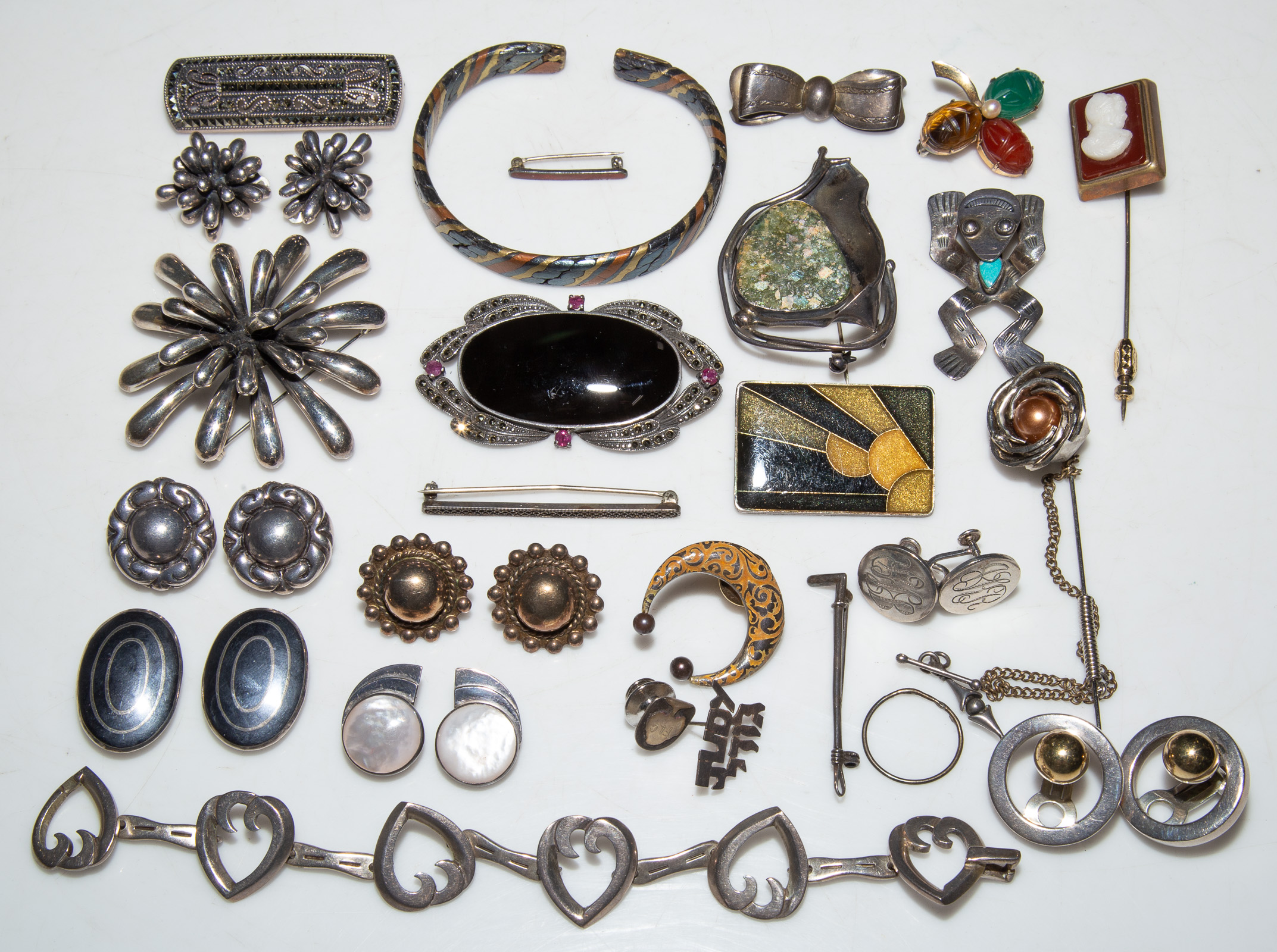 Appraisal: A SELECTION OF JEWELRY Includes clip-on-earrings a bracelet and pendants