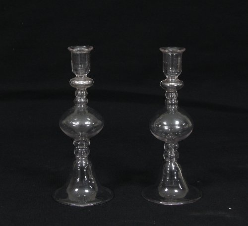 Appraisal: A pair of hand blown candlesticks each with knopped stem