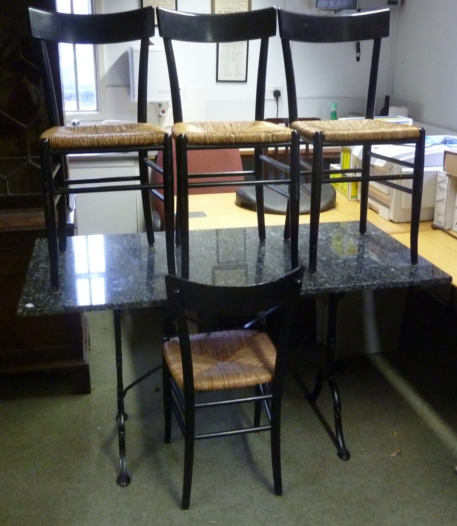 Appraisal: A modern cast iron table with granite top cm long