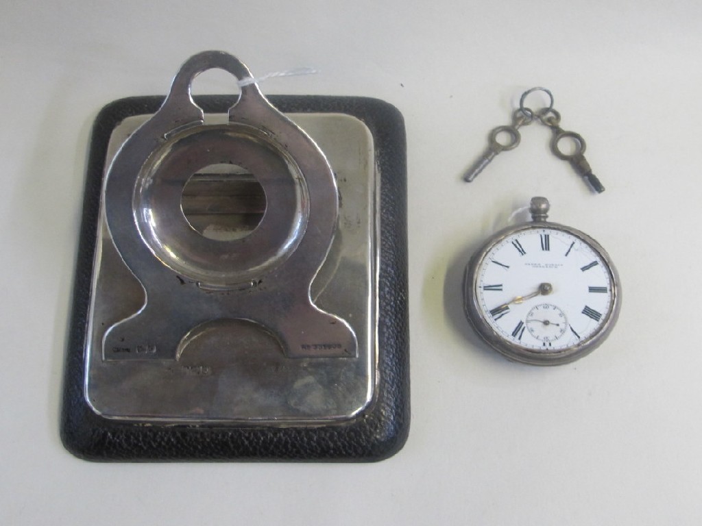 Appraisal: Lot comprising silver mounted watchstand letter clip and a pocket