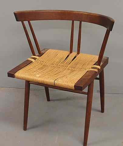 Appraisal: George Nakashima mahogany open armchair h x w x d