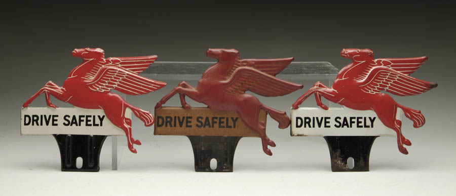 Appraisal: LOT OF THREE MOBILE PEGASUS LICENSE PLATE SIGNS Tin die