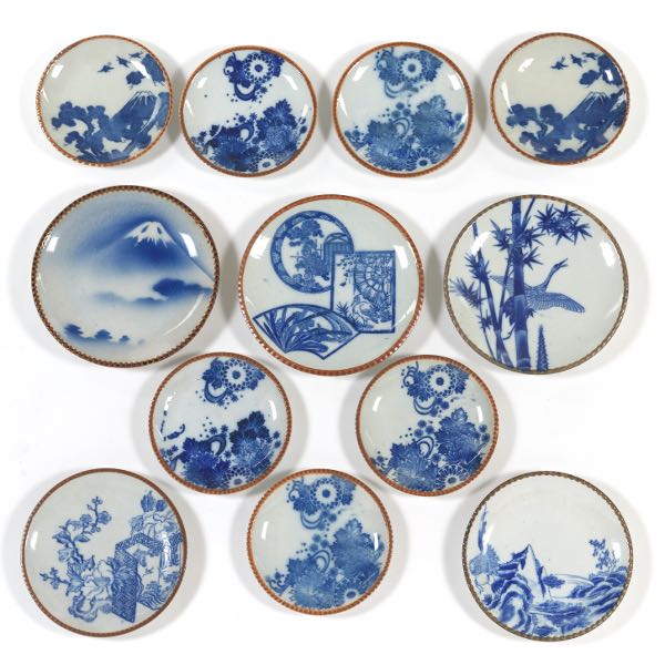 Appraisal: TWELVE JAPANESE TRANSFER WARE BLUE AND WHITE PORCELAIN IGEZARA PLATES