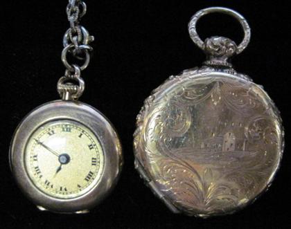 Appraisal: karat white gold pocket watch and yellow gold locketCircular case