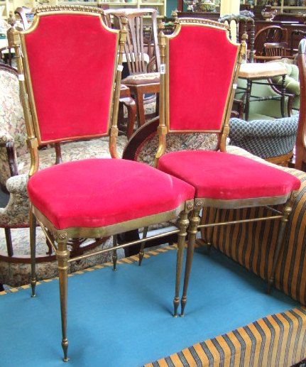 Appraisal: A pair of gilt metal and red velvet upholstered single