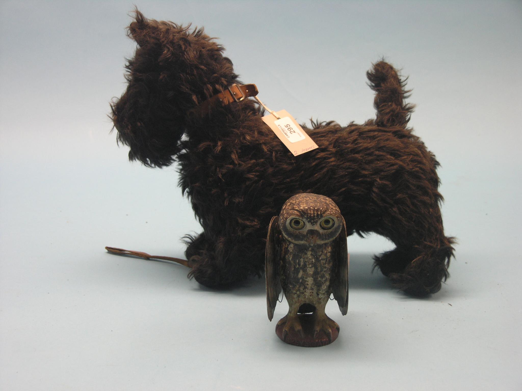 Appraisal: A Chiltern Toys Scottie Dog in and a French painted