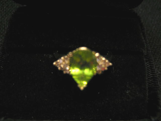 Appraisal: Peridot Diamond Ring pear shape gem with six diamonds on