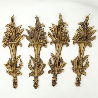 Appraisal: Set of Four Carved Gilt Wood Wall Appliques Unsigned Good