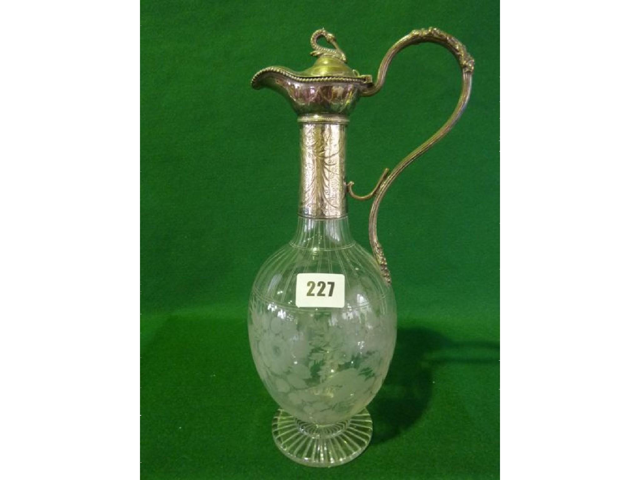 Appraisal: A th century claret jug engraved with floral decoration with