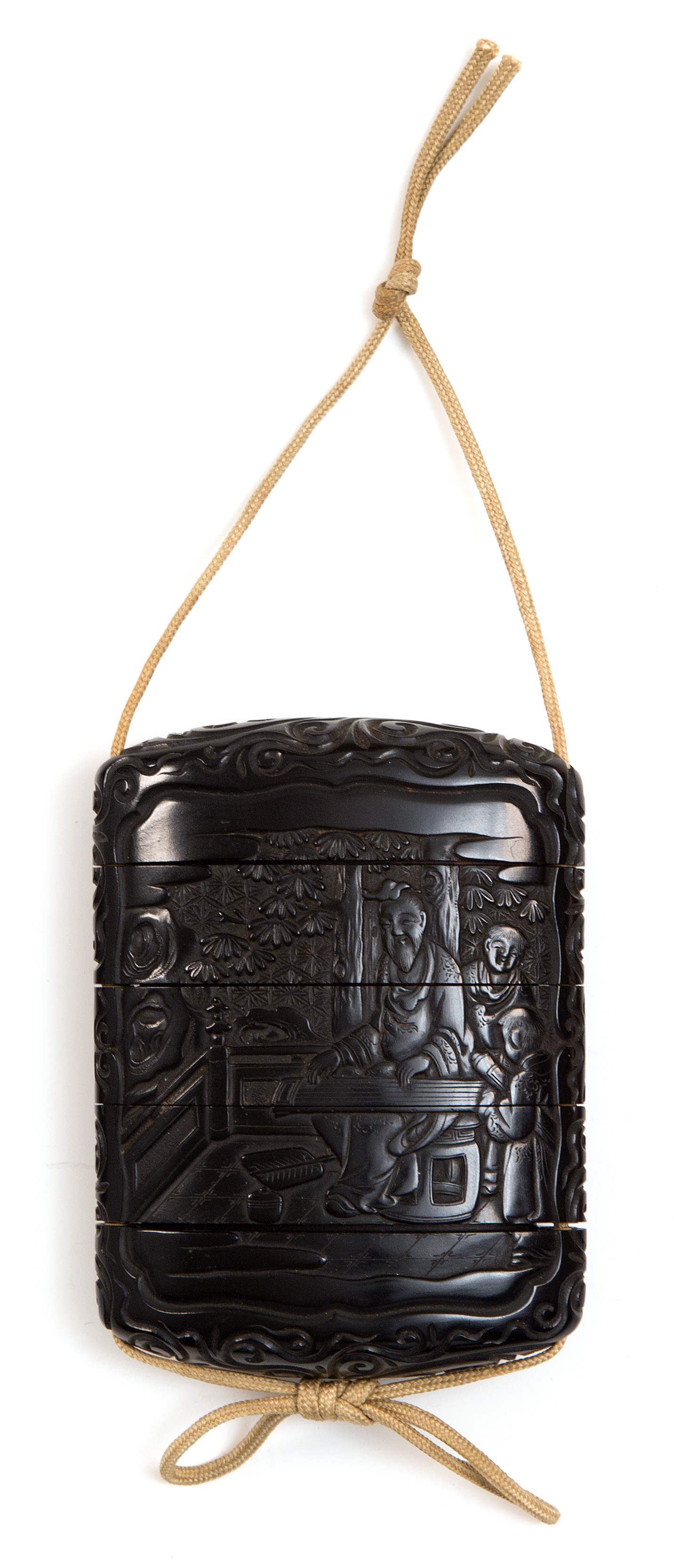 Appraisal: FOUR-CASE EBONY INRO th CenturyCarved on one face with scholar