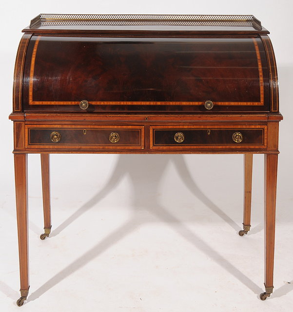 Appraisal: AN EDWARDIAN MAHOGANY SATINWOOD INLAID SHERITON REVIVAL CYLINDER BUREAU pierced