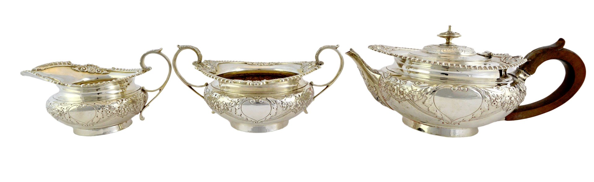 Appraisal: A late Victorian silver three piece tea set of compressed