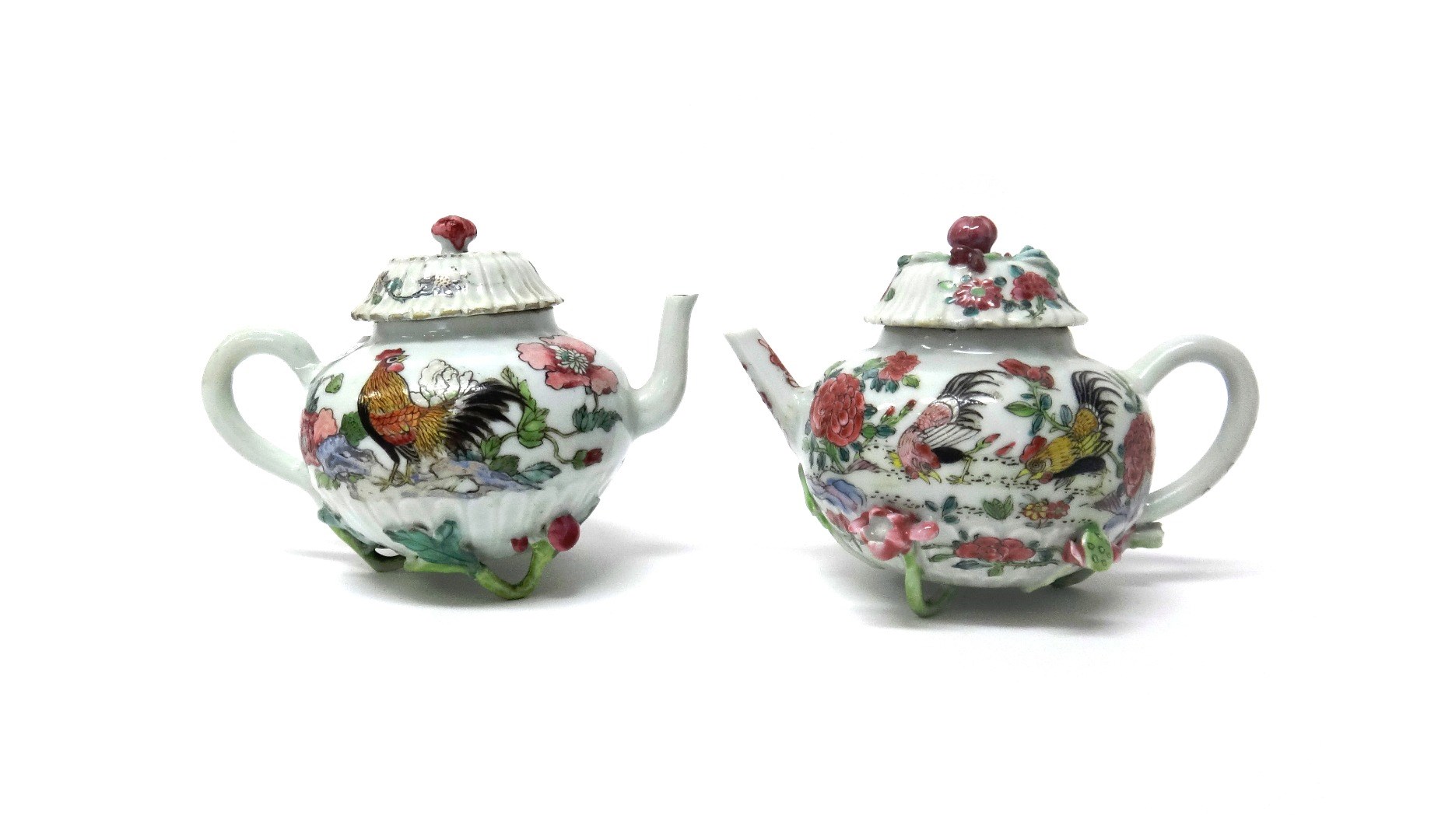 Appraisal: A pair of Chinese famille-rose globular teapots and covers Yongzheng