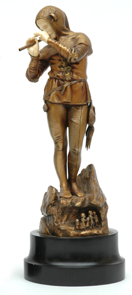 Appraisal: A PATINATED BRONZE AND IVORY FIGURE OF THE PIED PIPER