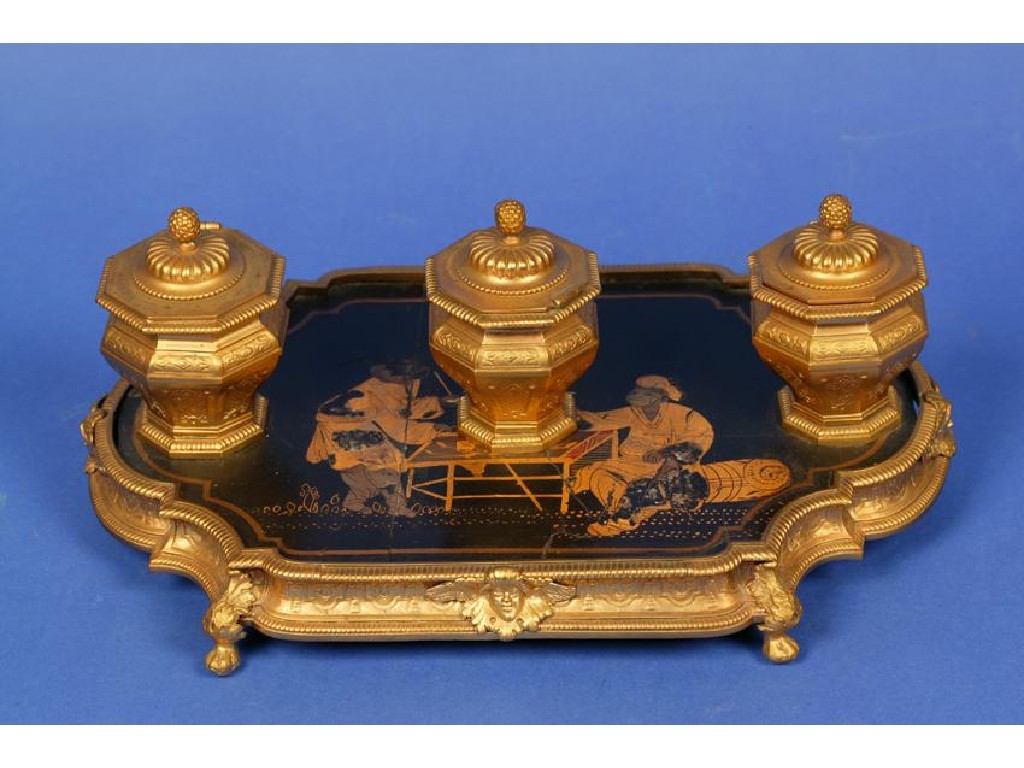 Appraisal: A REGENCE STYLE BLACK LACQUER AND GILT METAL DESK STAND