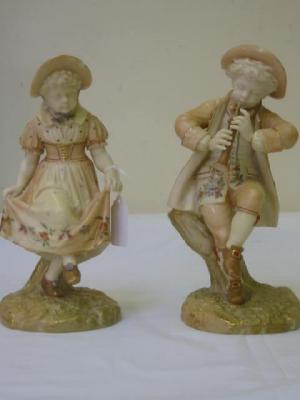 Appraisal: A PAIR OF ROYAL WORCESTER BLUSH PORCELAIN FIGURAL VASES pattern