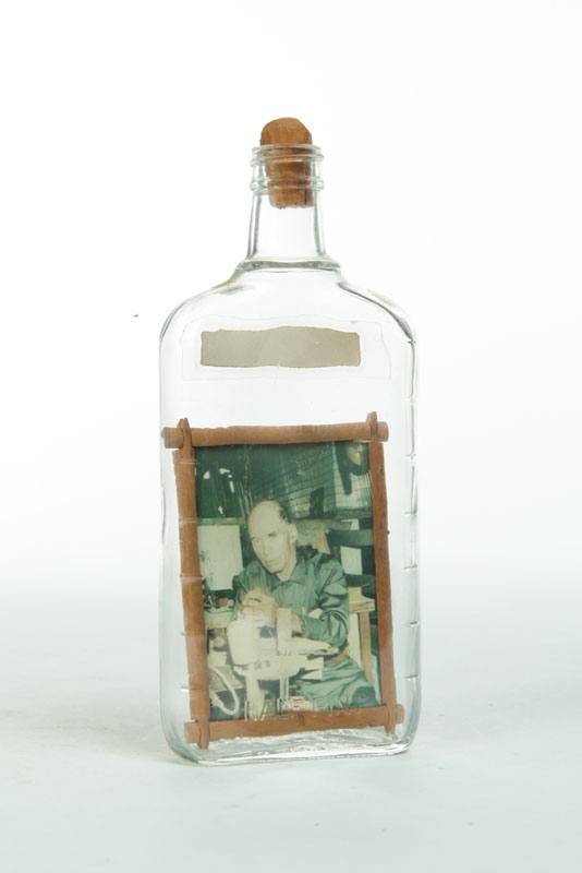 Appraisal: BOTTLE WHIMSEY American glass wood and photographs Two photos in