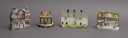 Appraisal: FOUR STAFFORDSHIRE TUDOR COTTAGES Including a lidded box one of