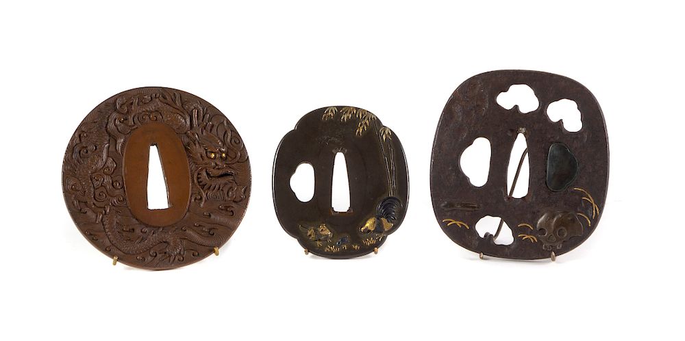 Appraisal: Three Japanese Tsuba Largest width in cm Three Japanese Tsuba