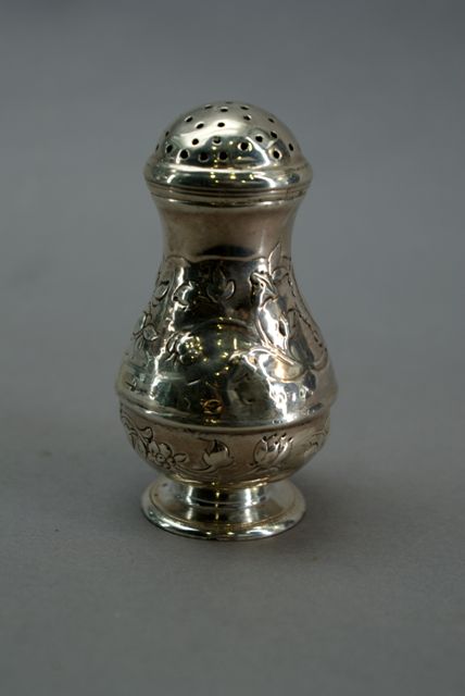 Appraisal: A baluster form sterling silver caster by Ralph Maidman London