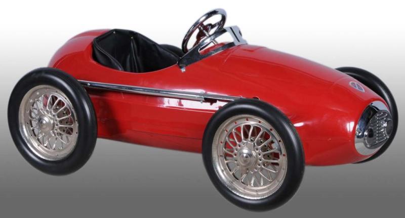 Appraisal: Pressed Steel Ferrari Pedal Car Description s Reproduction contemporary pedal