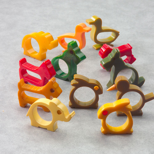 Appraisal: Twelve Bakelite napkin rings in whimsical animal forms ducks rabbits