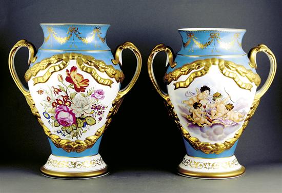 Appraisal: Pair Sevres style porcelain urns flared rim and ovoid body