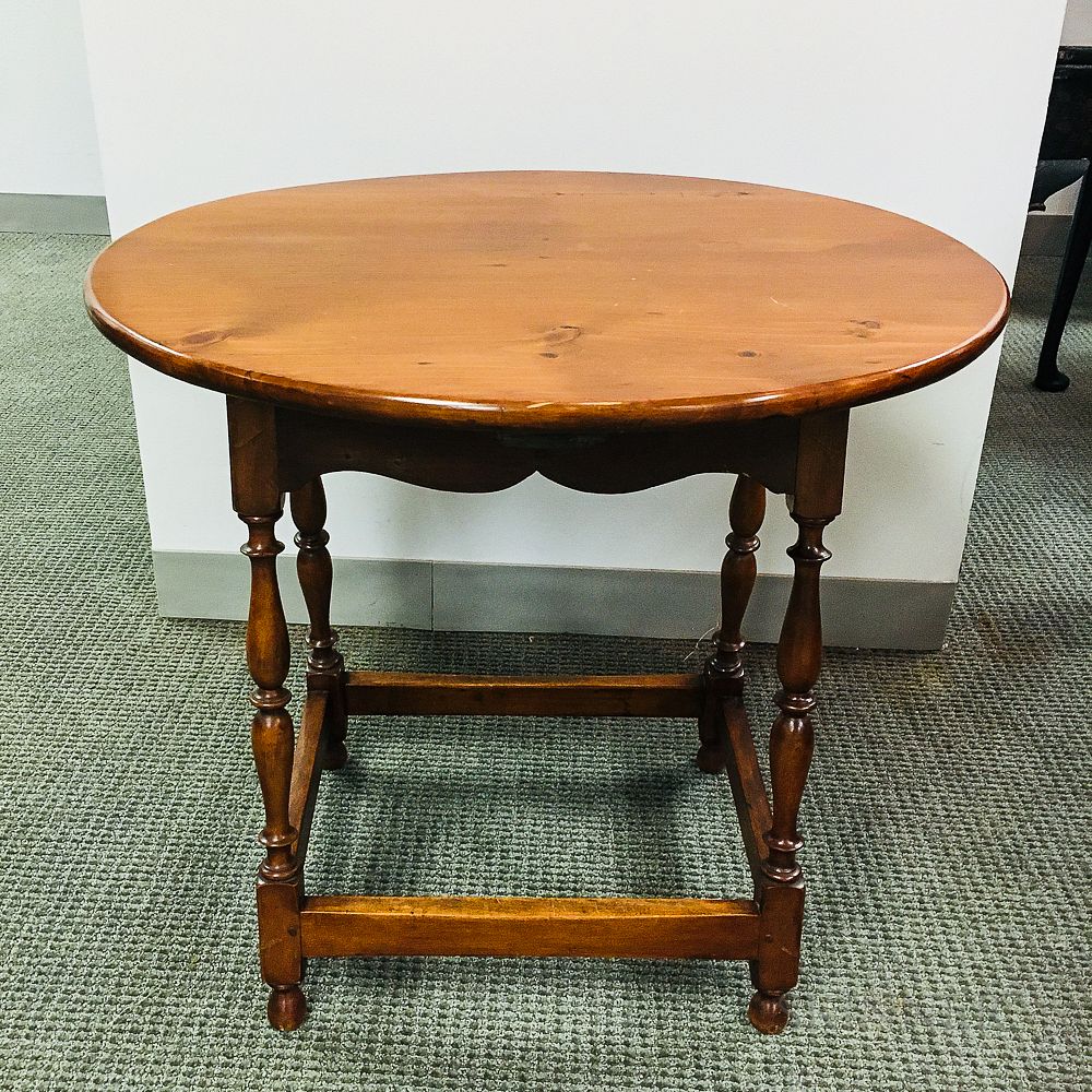 Appraisal: Pine and Maple Oval-top Tea Table Pine and Maple Oval-top