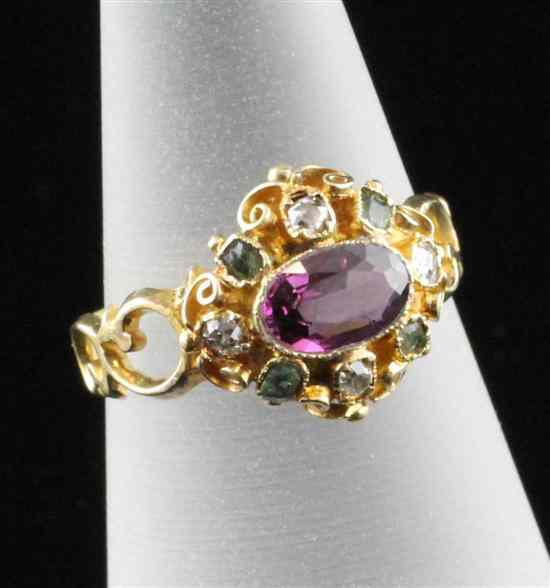 Appraisal: A th century gold almandine garnet emerald and diamond cluster