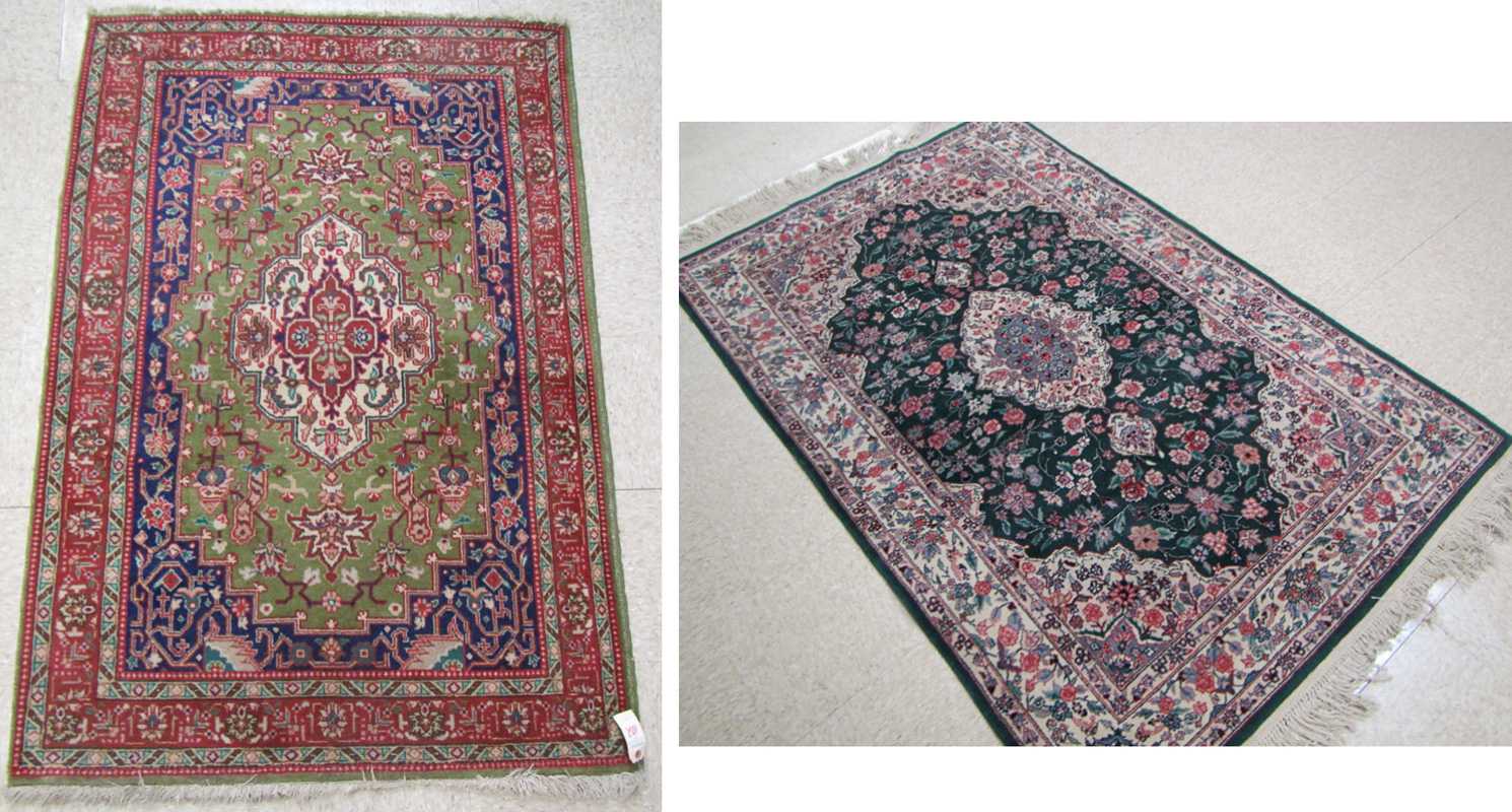 Appraisal: TWO HAND KNOTTED ORIENTAL GREEN FIELD AREA RUGS ' X