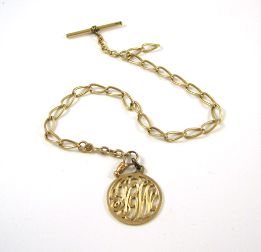 Appraisal: FOURTEEN KARAT GOLD WATCH CHAIN AND MONOGRAM FOB Weight grams