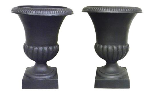 Appraisal: Pair th C cast-iron black painted garden urns flared lip