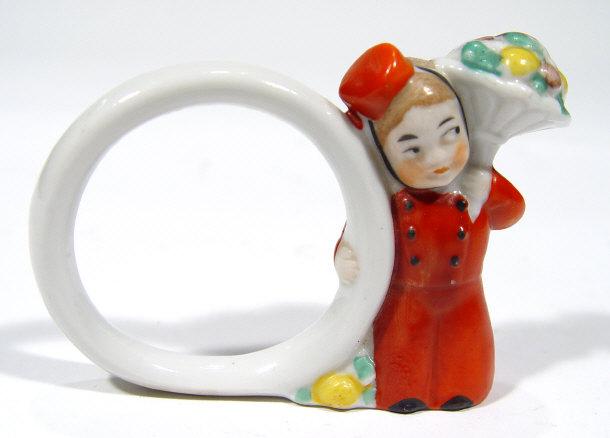 Appraisal: Goebel porcelain napkin ring the ring supported by a hand