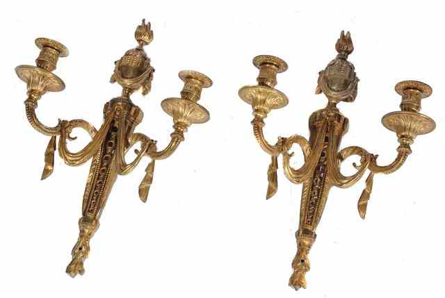 Appraisal: A PAIR OF ORMOLU TWO BRANCH WALL LIGHTS of classical