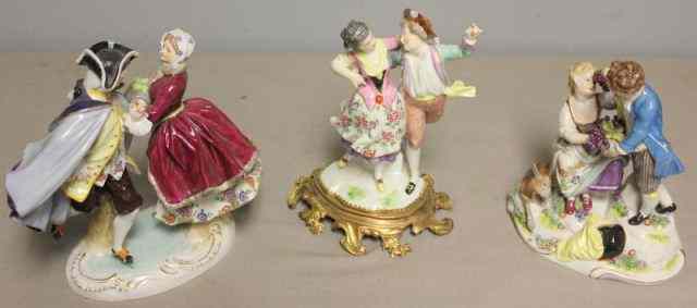 Appraisal: Continental Porcelain Figural Groupings with a bronze mounted base ''