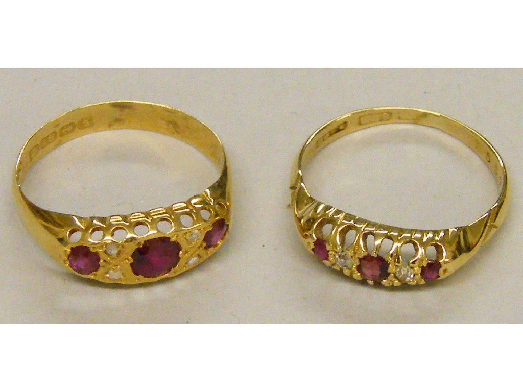 Appraisal: Two similar ct ruby and diamond rings in claw settings