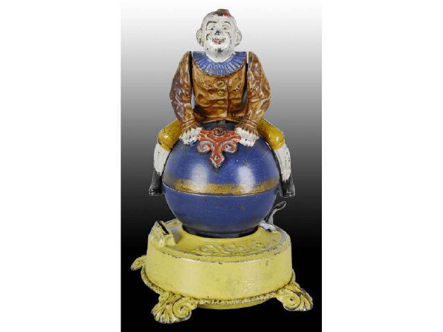 Appraisal: Cast Iron Clown on Globe Mechanical Bank Description -B Scarce