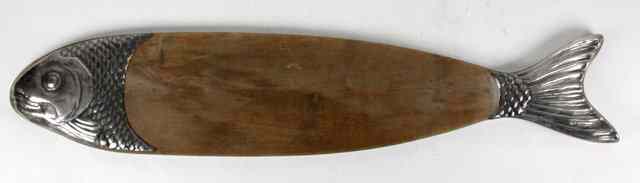 Appraisal: A wooden salmon serving dish with silver plated head and