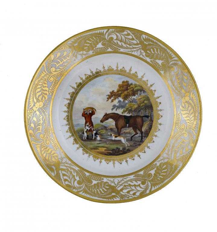 Appraisal: A DERBY PLATE painted with a fox hunting scene in